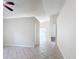 Spacious living room featuring neutral-toned tile flooring and ample natural light at 2422 Condado Ct, Kissimmee, FL 34743