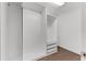 Walk-in closet with open shelves and built-in storage solutions at 2432 Riviera Ln, Minneola, FL 34715