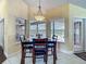 Inviting dining area with a backyard view is perfect for entertaining and enjoying meals at 2558 Ballard Ave, Orlando, FL 32833