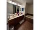 Bathroom features a double sink vanity with a soaking tub at 2564 River Landing Dr, Sanford, FL 32771