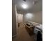 Upstairs hallway with natural light, carpet flooring, and a desk area at 2564 River Landing Dr, Sanford, FL 32771