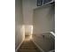 Carpeted staircase with a white handrail leading to the lower level of the home at 2564 River Landing Dr, Sanford, FL 32771