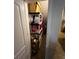 Storage closet with shelving units, providing ample space for organization and storage at 2564 River Landing Dr, Sanford, FL 32771