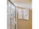 Updated bathroom featuring a tiled shower with glass door, and towel rack, creating a spa-like experience at 2616 Bowring St, Kissimmee, FL 34747
