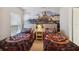 Charming bedroom featuring themed bedding and decor, creating a cozy and inviting space at 2616 Bowring St, Kissimmee, FL 34747