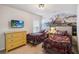 Themed bedroom with castle mural, twin beds, and vibrant decor, creating a fun and magical atmosphere at 2616 Bowring St, Kissimmee, FL 34747