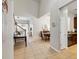 Spacious foyer showcases tile flooring, access to dining, living area, and a staircase to the upper level at 2616 Bowring St, Kissimmee, FL 34747