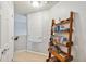 Upper level hallway featuring a bookshelf, creating a cozy reading nook and adding character at 2616 Bowring St, Kissimmee, FL 34747