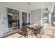 Covered patio with sliding glass doors and outdoor furniture, perfect for relaxing at 2616 Bowring St, Kissimmee, FL 34747