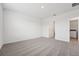 Cozy bedroom featuring neutral carpet, ample natural light, and a walk-in closet at 2778 Virginia Pine Dr, Bartow, FL 33830