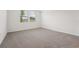 Bright bedroom with carpet, natural light, and neutral paint scheme at 2778 Virginia Pine Dr, Bartow, FL 33830