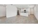 Open-concept living area with tile floors connecting the kitchen and living spaces at 2778 Virginia Pine Dr, Bartow, FL 33830