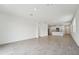 Spacious living area showcasing tiled floors and an open layout connecting the living and kitchen spaces at 2778 Virginia Pine Dr, Bartow, FL 33830