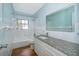 This bathroom offers a combination tub and shower, a large mirror, and nice vanity at 2809 Sanbina St, Winter Park, FL 32789