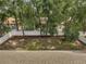 Spacious backyard featuring a well-maintained fence and mature trees at 2823 Ne 24Th Pl, Ocala, FL 34470