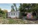 Shed decorated with faux foliage and tropical plant decor at 31701 State Road 44 Sr-44, Eustis, FL 32736