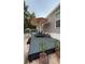 Outdoor patio with lounge seating and an umbrella for shade at 31701 State Road 44 Sr-44, Eustis, FL 32736