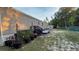 A spacious backyard featuring a deck, potted plants, and privacy fencing, perfect for outdoor entertaining at 31701 State Road 44 Sr-44, Eustis, FL 32736