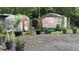Outdoor sheds with faux foliage and tropical plant decor at 31701 State Road 44 Sr-44, Eustis, FL 32736