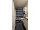 Bathroom featuring blue striped shower curtain, vanity, toilet and white walls at 31701 State Road 44 Sr-44, Eustis, FL 32736