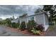 Charming single-story home with gray siding and colorful landscaping, creating a welcoming curb appeal at 31701 State Road 44 Sr-44, Eustis, FL 32736