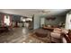 Open concept living space with a view of the dining area and kitchen, creating a spacious and connected atmosphere at 31701 State Road 44 Sr-44, Eustis, FL 32736