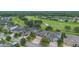 An aerial view of houses with well-kept yards and landscaping in a desirable neighborhood at 31961 Redtail Reserve Blvd, Sorrento, FL 32776