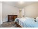 Comfortable bedroom featuring wood-look flooring, and closet space at 31961 Redtail Reserve Blvd, Sorrento, FL 32776