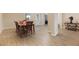 Inviting dining room featuring a wood table with seating, connecting to the foyer and living spaces at 31961 Redtail Reserve Blvd, Sorrento, FL 32776