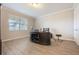 Inviting office space with wood-look flooring, a large desk, and a bright window view at 31961 Redtail Reserve Blvd, Sorrento, FL 32776