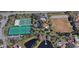 Eagle Park featuring tennis courts, basketball courts, a park, a large playing field and a pond with a dock at 3713 Ocita Dr, Orlando, FL 32837
