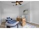 Cozy office space with unique wood desk, comfortable seating, and natural light, creating an ideal workspace at 3713 Ocita Dr, Orlando, FL 32837