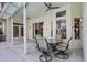Spacious covered patio features a ceiling fan and an outdoor dining area at 3713 Ocita Dr, Orlando, FL 32837