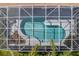 Aerial view of screened pool, surrounded by lush greenery and rock at 3713 Ocita Dr, Orlando, FL 32837