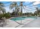 Screened-in pool with comfortable seating perfect for enjoying outdoors at 3713 Ocita Dr, Orlando, FL 32837