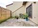 The patio offers a private outdoor space with a partial fence, plants, and tile ground at 513 Hunter Cir # 513, Kissimmee, FL 34758