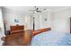 Primary bedroom features hardwood floors, a walk-in closet, and an en-suite bathroom at 528 Greely St, Orlando, FL 32804