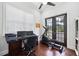 Bright home office with a ceiling fan, an exercise machine, and a view to the outside at 528 Greely St, Orlando, FL 32804