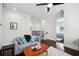 Cozy upstairs loft area with comfortable seating, hardwood floors, and natural light at 528 Greely St, Orlando, FL 32804