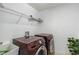 Functional laundry room with a utility sink, shelving, and washer and dryer at 530 Harriswood Ct, Davenport, FL 33837