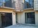 Patio view highlighting balconies and sliding glass doors at 5327 Bamboo Ct # 426, Orlando, FL 32811