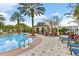 Resort-style pool area with comfortable lounge chairs, beautiful landscaping, and a gazebo for relaxation and recreation at 5350 Penway Dr, Orlando, FL 32814