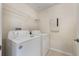 This laundry room features a washer and dryer at 5350 Penway Dr, Orlando, FL 32814