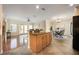 Open-concept living areas that blend the kitchen, breakfast bar, dining area, and living room for comfortable entertaining at 5350 Penway Dr, Orlando, FL 32814