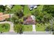 Aerial view of a single-story house, surrounded by lush greenery and a well-kept lawn at 543 Silver Crse, Ocala, FL 34472