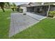 An expansive backyard features a tiled patio and a covered screened lanai for outdoor living at 543 Silver Crse, Ocala, FL 34472