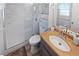 Bathroom with tiled shower, toilet, and sink at 543 Silver Crse, Ocala, FL 34472