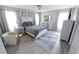 Bright bedroom offers a comfortable bed and neutral decor at 543 Silver Crse, Ocala, FL 34472