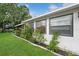 Exterior view of well-maintained home showing landscaped garden bed along the house at 543 Silver Crse, Ocala, FL 34472