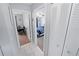 Hallway showcasing entryways to bedrooms and closet at 543 Silver Crse, Ocala, FL 34472